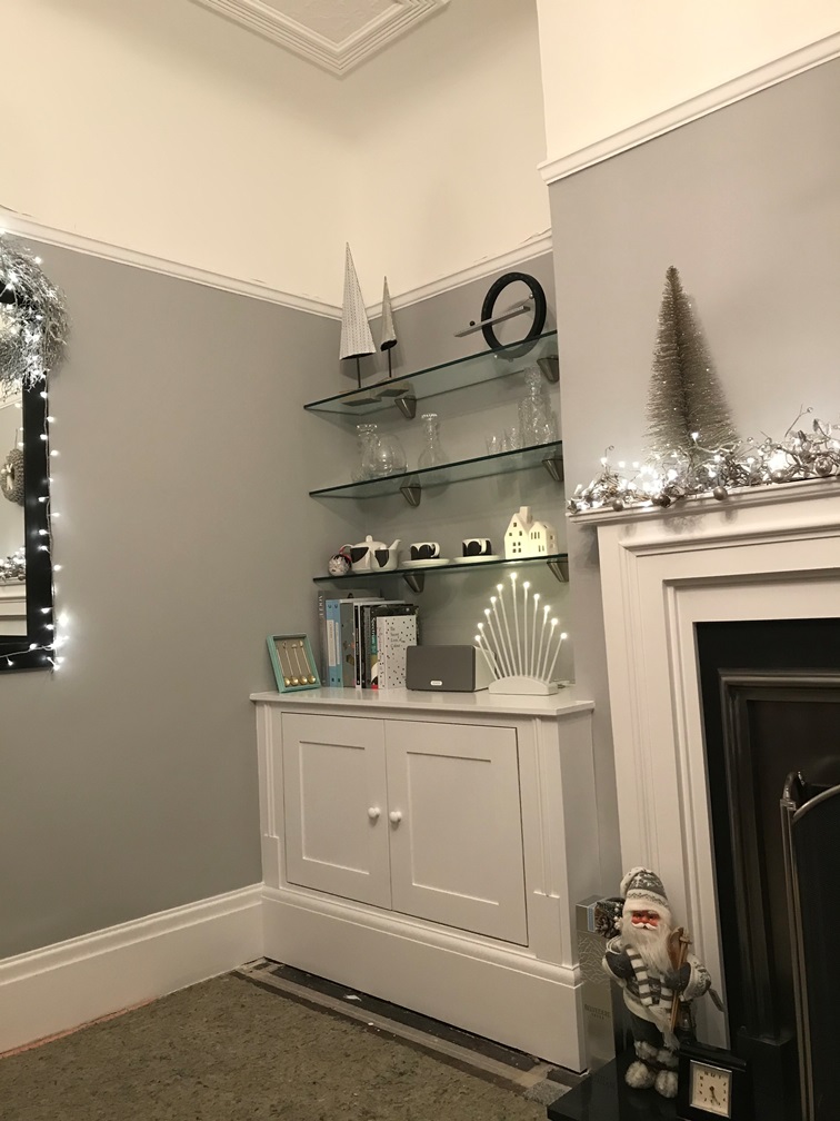 fitted alcove unit with glass shelves