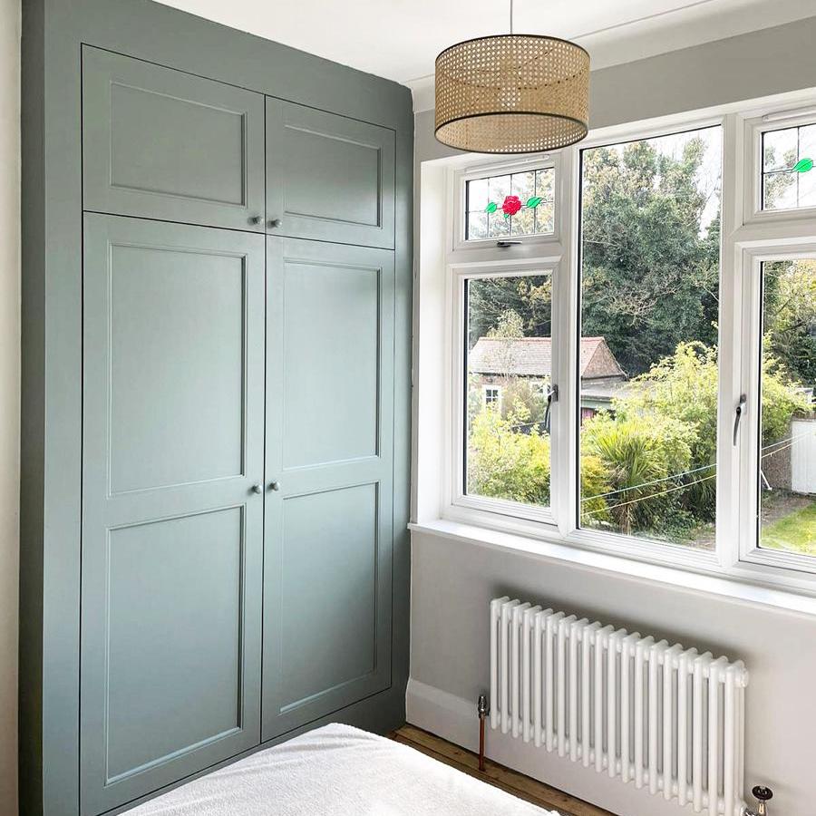 Fitted bedroom wardrobe with colour-match paint