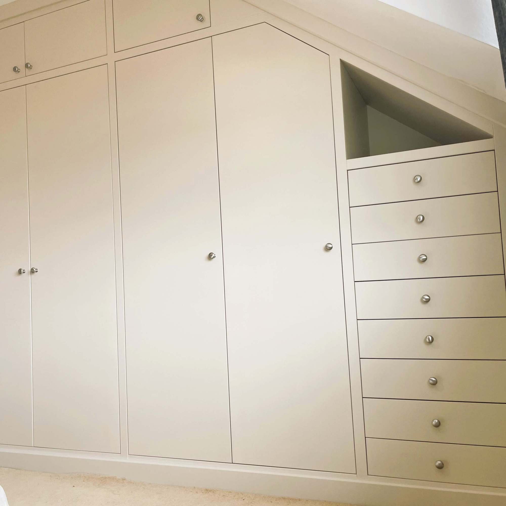 Fitted wardrobe made to fit in loft space