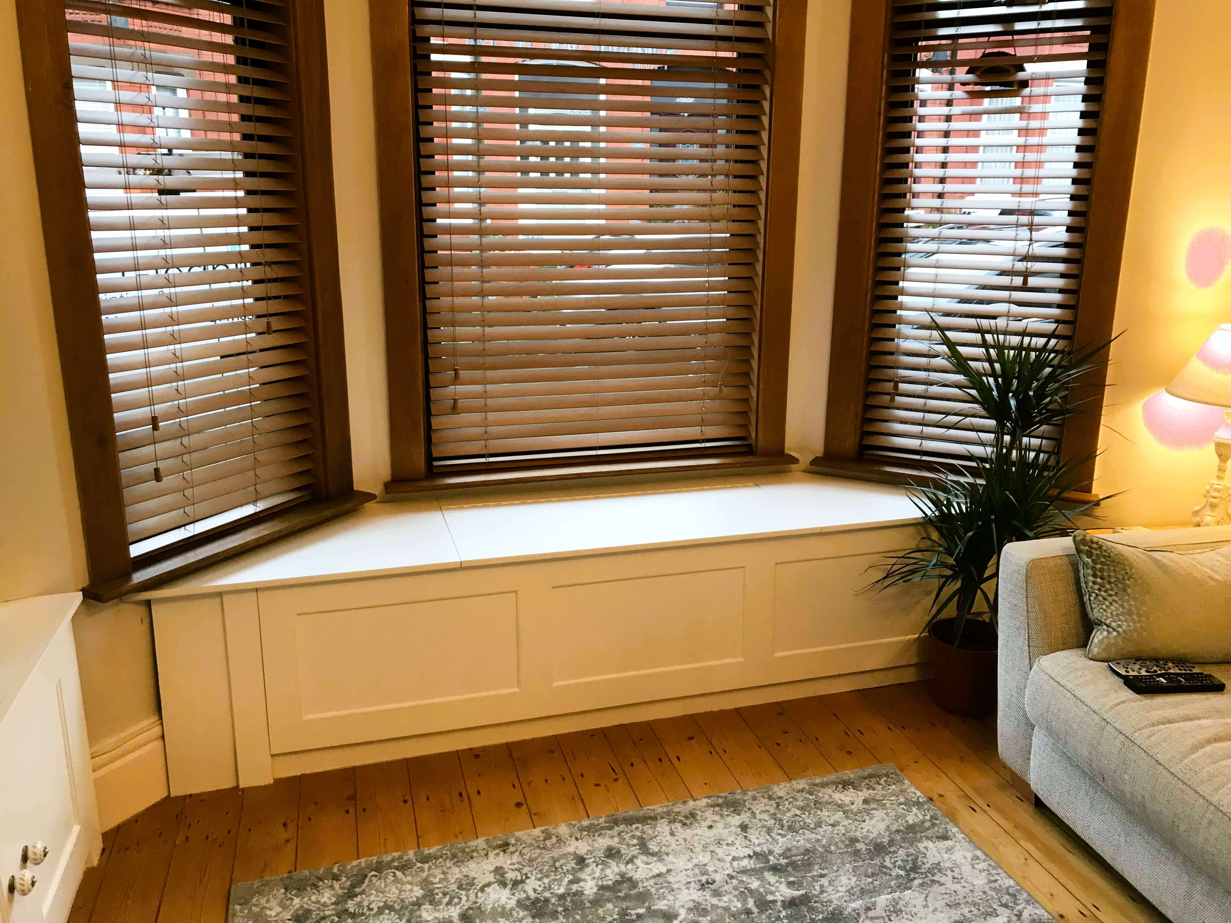 Fitted window seat with internal hidden storage