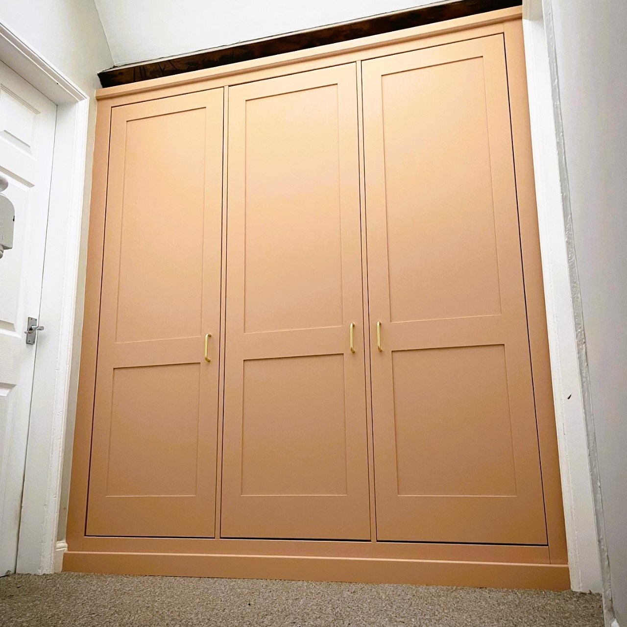 Triple wardrobe fitted in awkward loft space